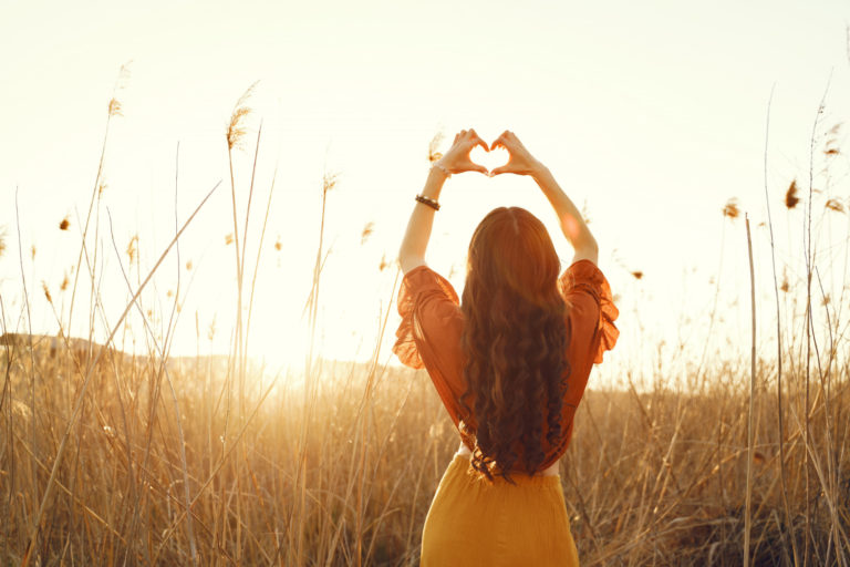 stylish-woman-spending-time-summer-field